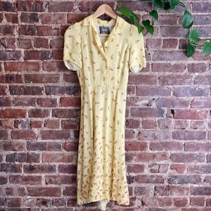 Reformation yellow midi dress with rose print with keyhole size 0